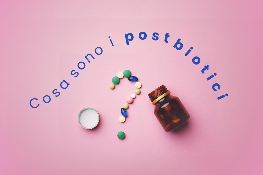 barattolo di pillole che formano un punto interrogativo che completa la frase " che cosa sono i postbiotici?"